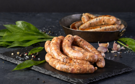 Grilling sausage with wild garlic 